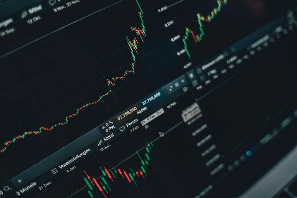 Financial graphs on a laptop screen